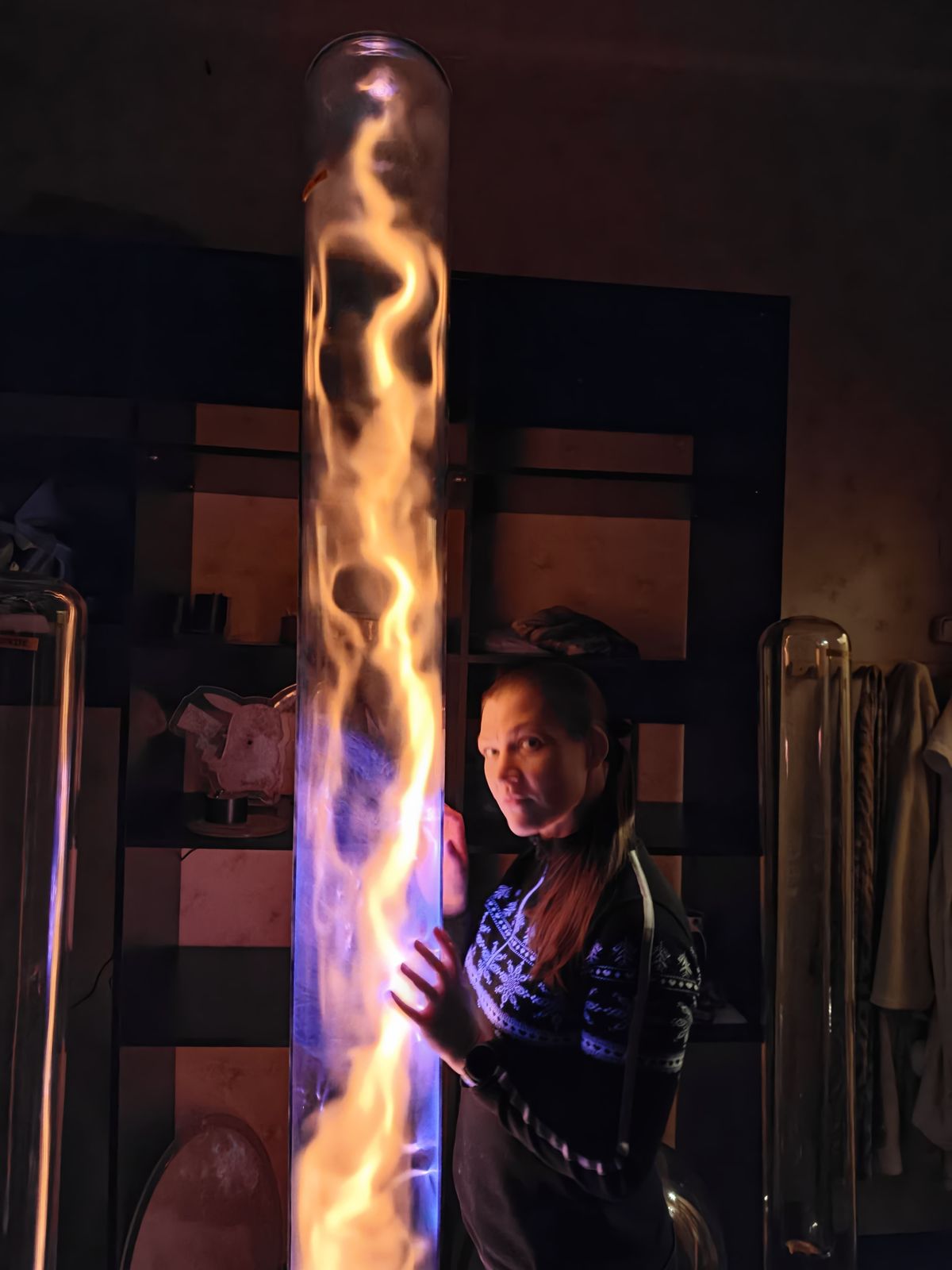 Two-meter orange plasma tube with a person